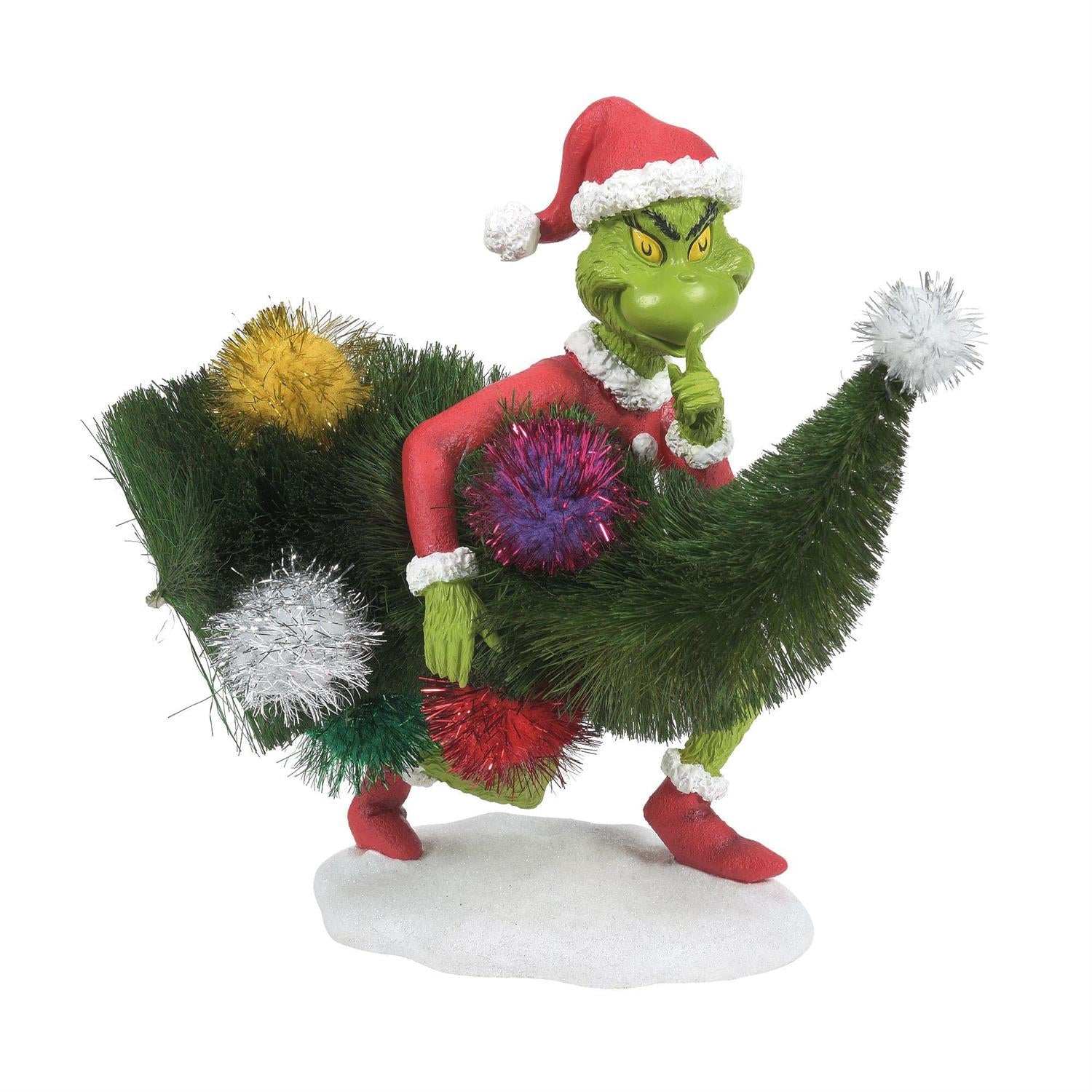 Grinch carrying the tree
