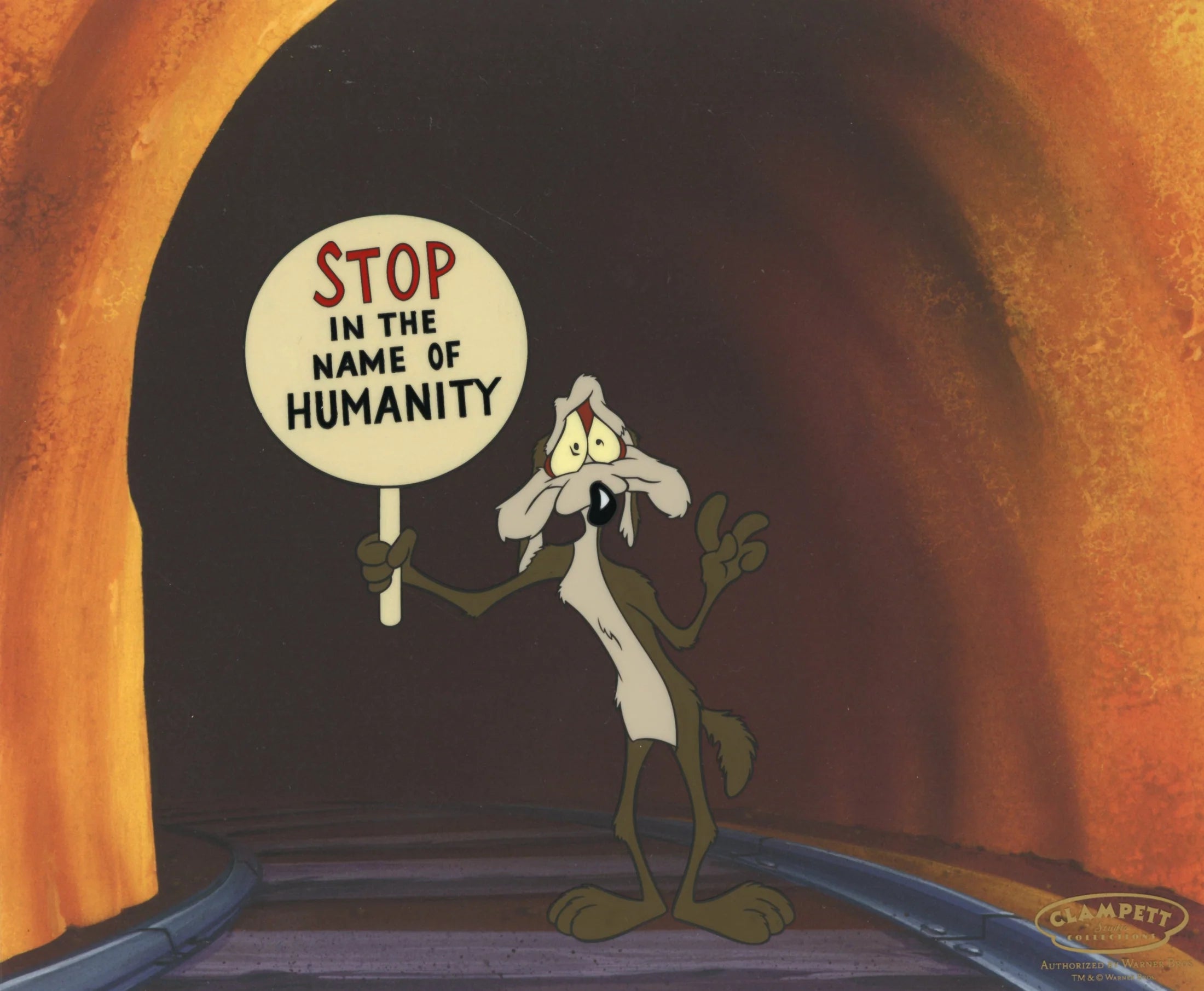 Wile E. Coyote holds up a sign. "IN THE NAME OF HUMANITY"