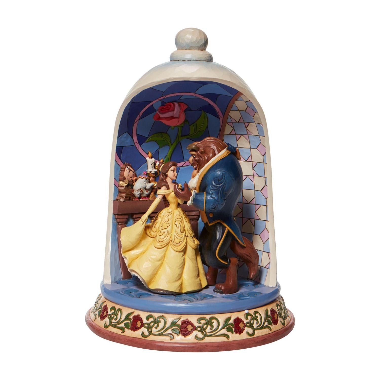 Lumiere, Cogsworth, and Mrs. Potts watch as Belle and the Beast share a moonlight waltz and loving gaze.
