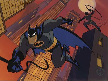 Batman decending from a tall building with Catwoman about to pursue.