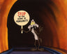 Wile E. Coyote is holds up sign - "STOP IN THE NAME HUMANITY"