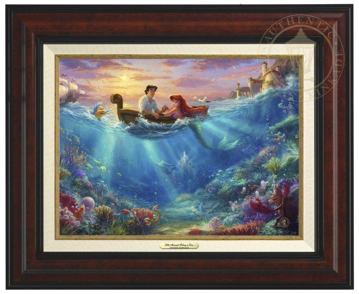 Little Mermaid Falling in Love by Thomas Kinkade Studios. Ariel and Prince Eric share precious time together with Flounder and Sebastian nearby. The wretched sea witch, Ursula, lurks in the shadows for her opportunity to strike. Deep below King Triton races from the castle in Atlantica to rescue his daughter- Burl Frame