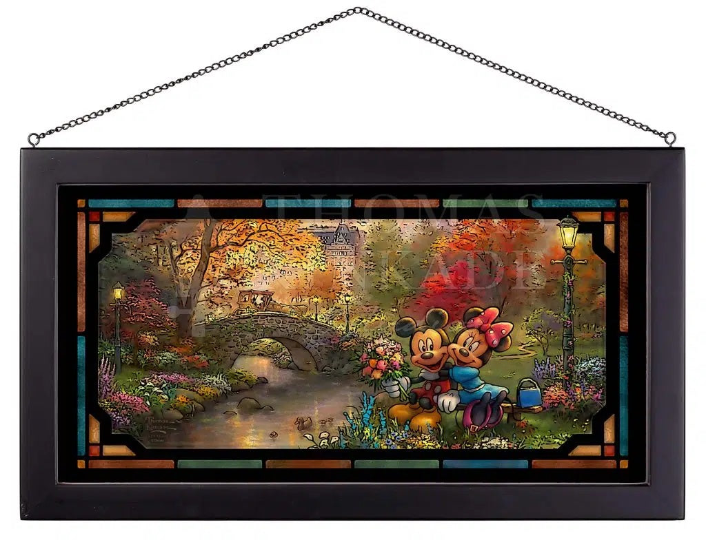 Mickey hands Minnie a beautiful bouquet; a thankful Minnie throws her arms around Mickey&