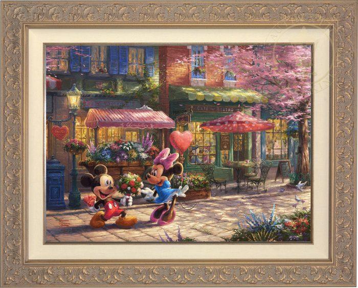 Mickey presents Minnie with a bouquet of flowers and a heart shaped box of chocolate in front of Cafe Bristo - Carrisa Frame