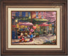 Mickey presents Minnie with a bouquet of flowers and a heart shaped box of chocolate in front of Cafe Bristo - Dark Walnut Frame