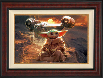 Gallery Burl Framed artwork of a character in a desert setting with a spaceship in the background
