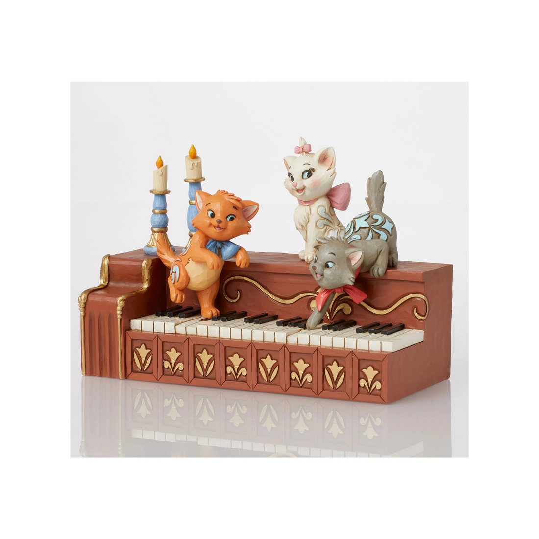 Marie, Toulouse, and Berlioz playing around the piano.