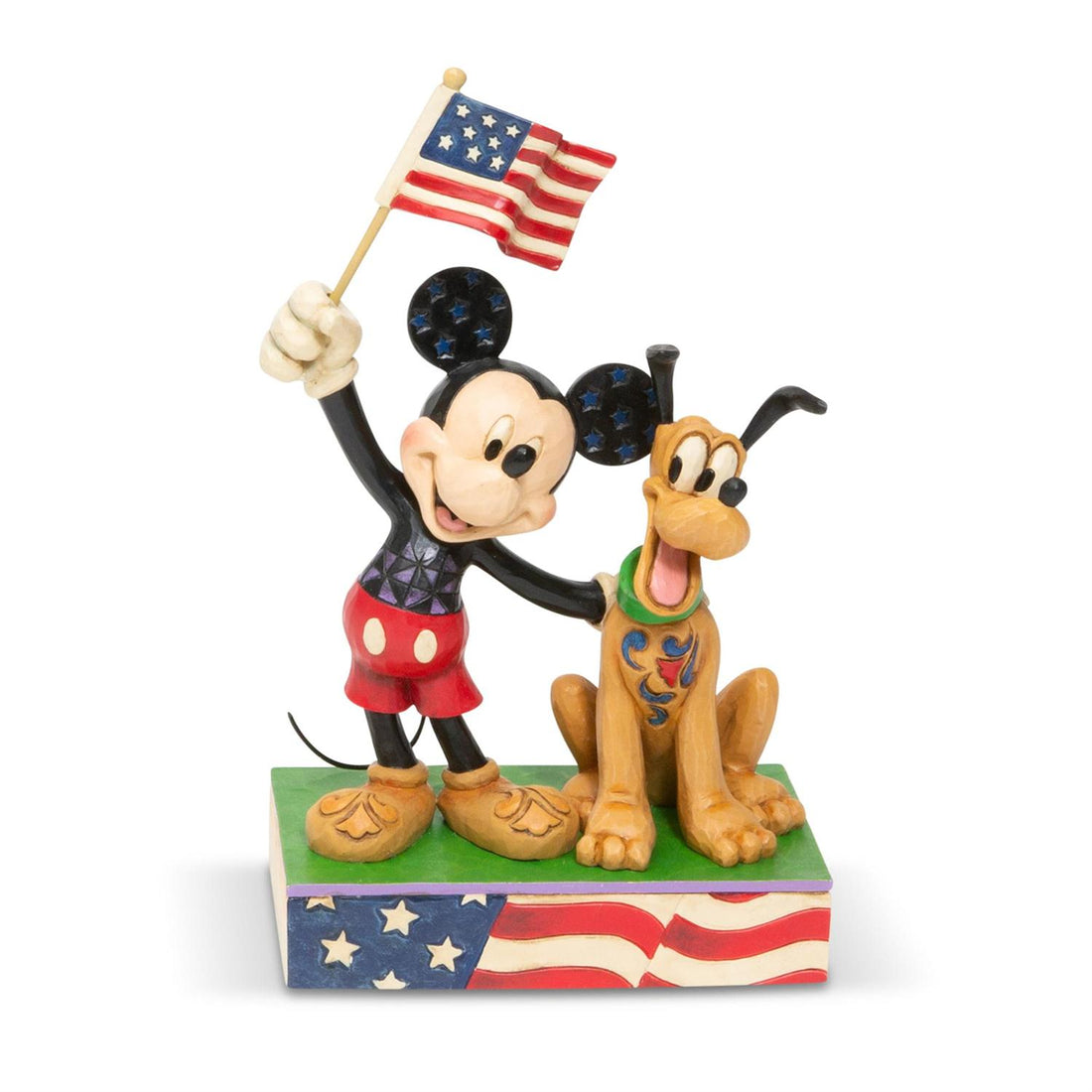 Mickey holding up an American Flag with his bud Pluto