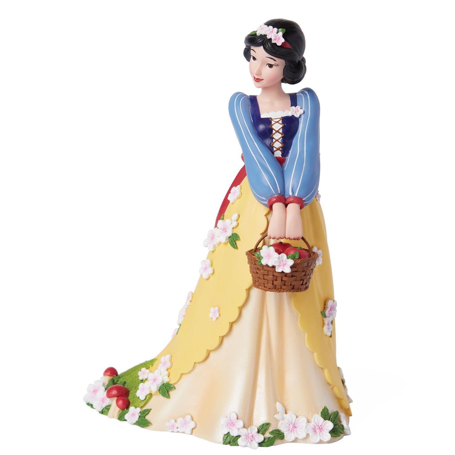 Snow White holding a basket full of flowers