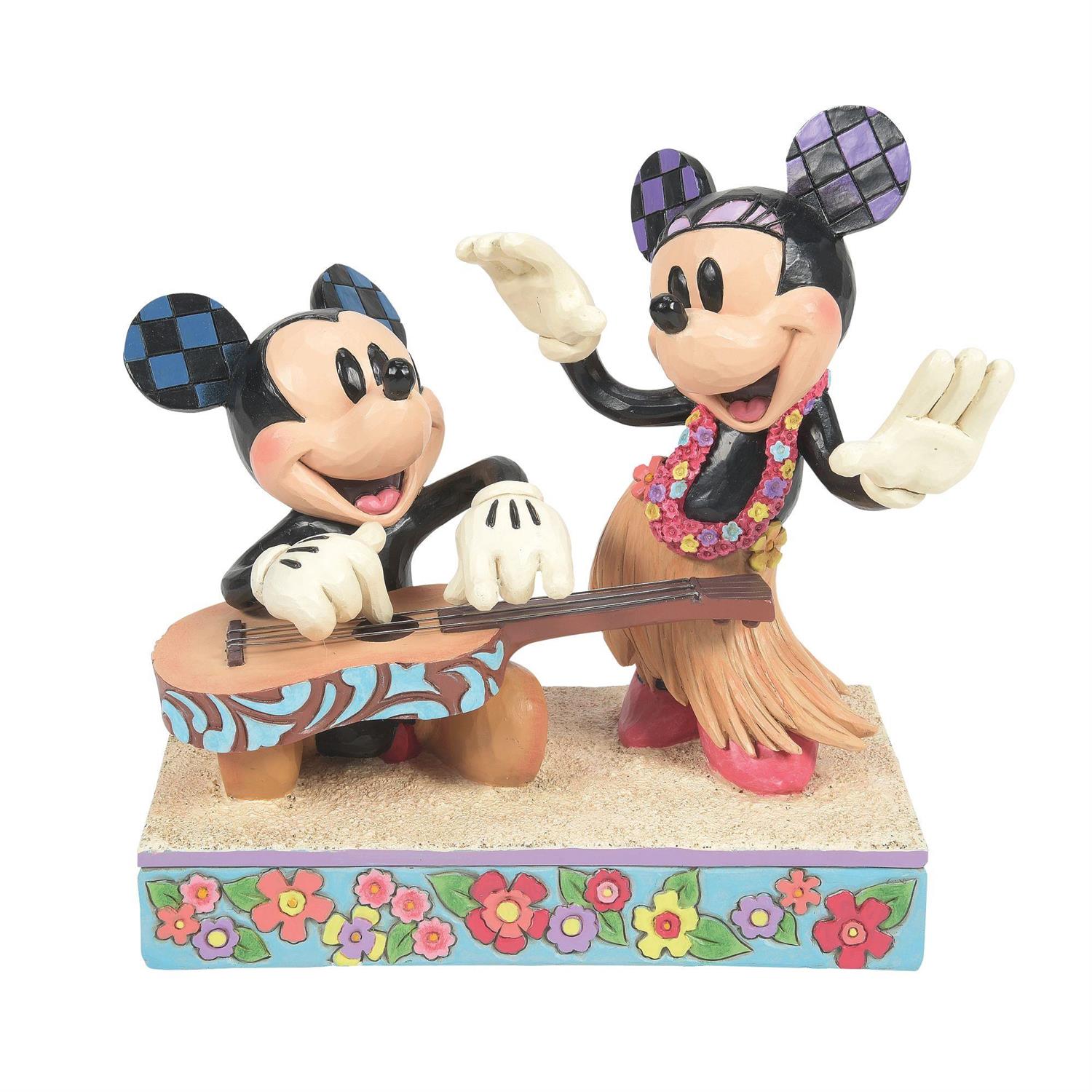  Mickey strums his guitar in a sweet serenade as Minnie
