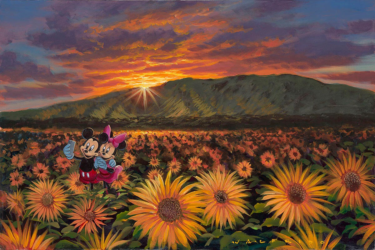 Mickey and Minnie in the middle of a Sun Flower field