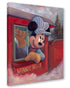 Mickey Mouse is leaning out of a red train car, with the words "MINNIE BELLE" visible on the front. Photographed at a slight angle against a white background.