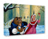 A square canvas wall art print featuring an illustrated winter scene with the Beast in a blue coat and a woman in a pink dress holding a red bird, shown at an angle against a white studio background.