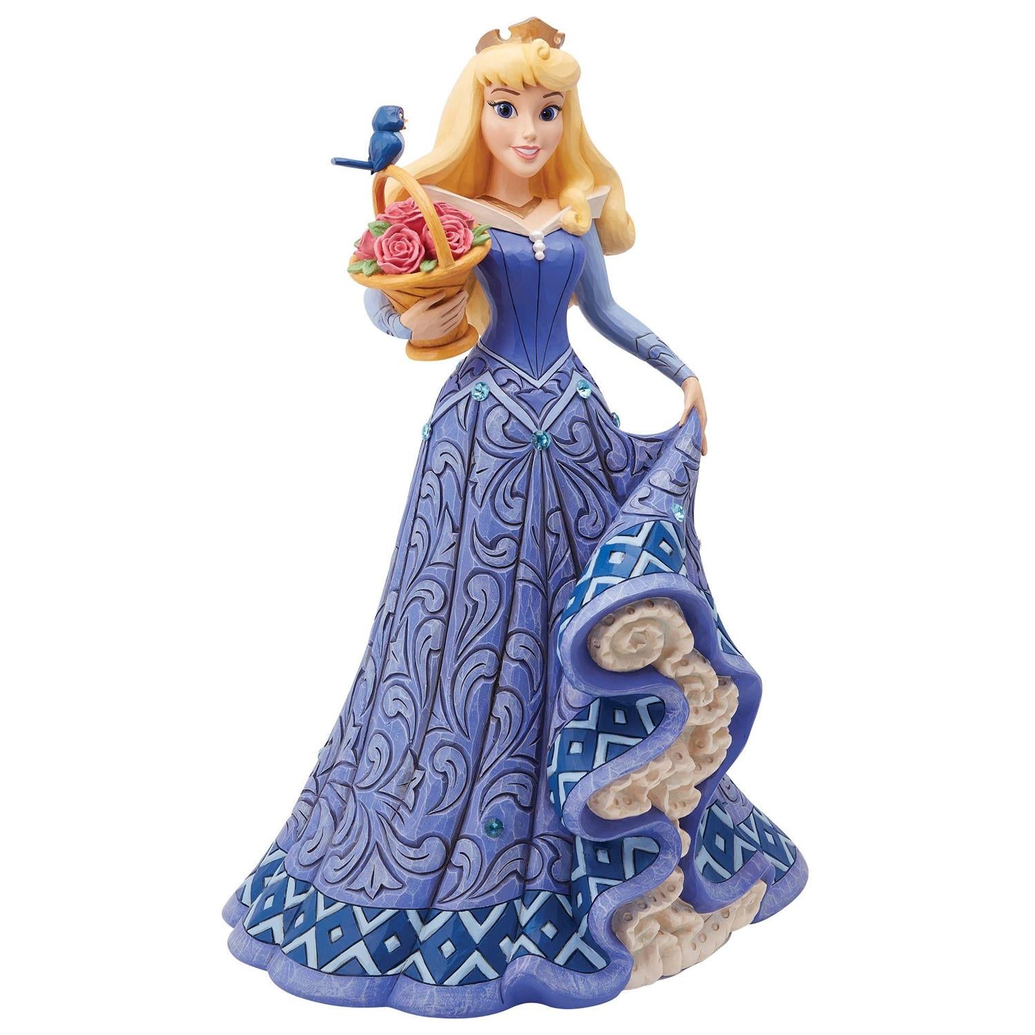 Princess Aurora in a blue gown holding a basket full of roses