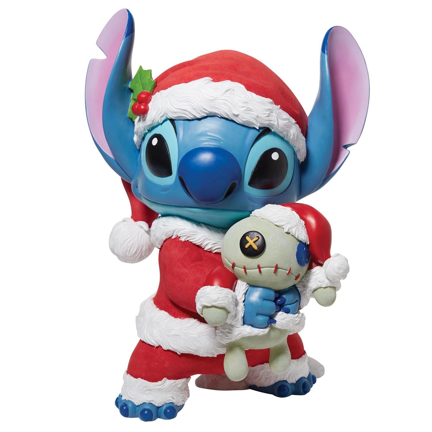 Stitch as Santa holding Lilo's ugly doll.