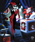 Classic Harley poses dressed in her jester costume, standing next to a Jack in the Box pop-up of the Joker.