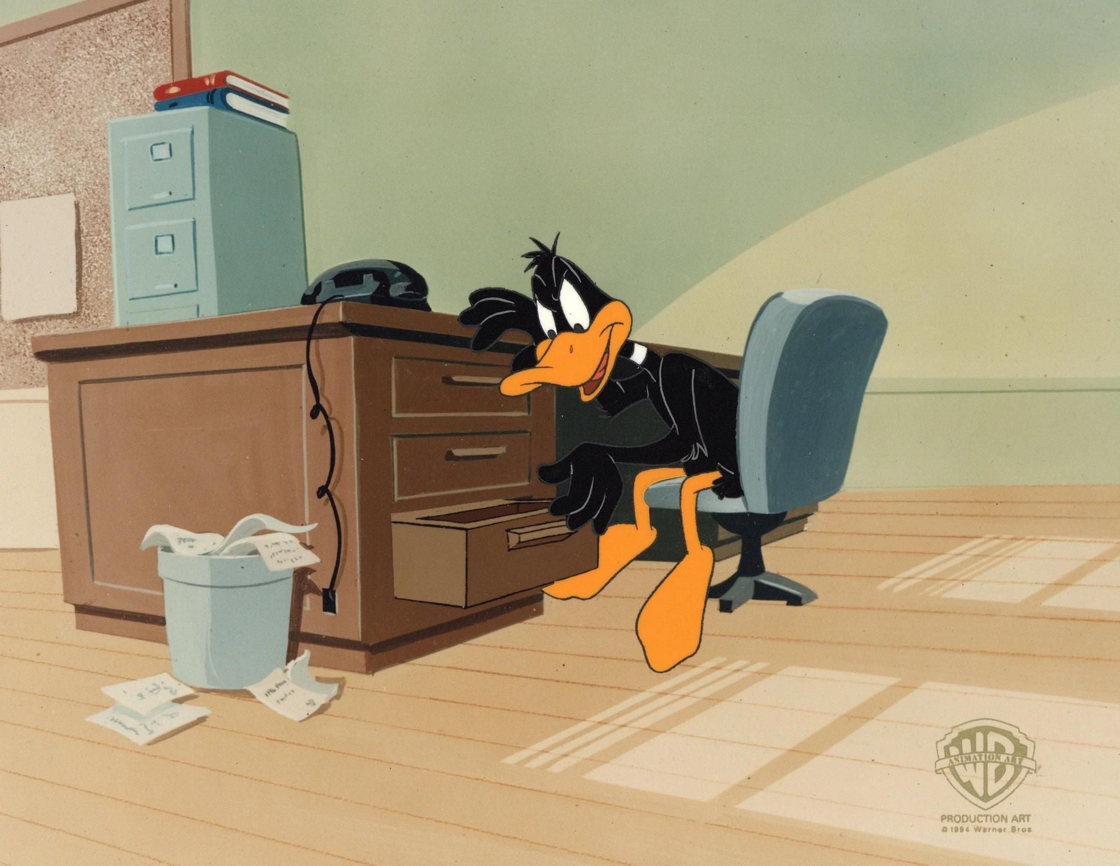 Daffy Duck cleaning out his desk