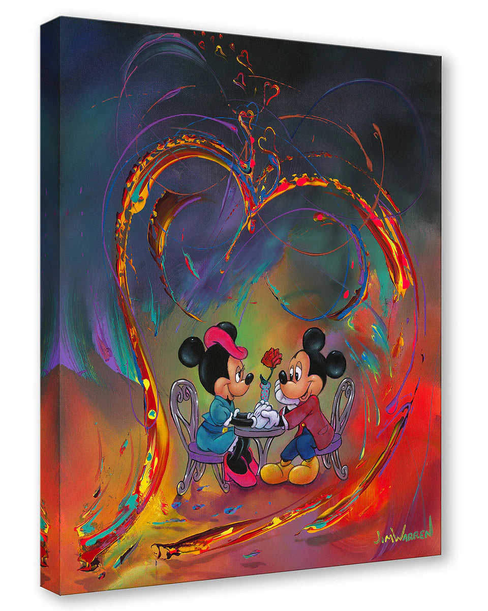 Mickey and Minnie sharing a romantic moment as they sit at a bristo table holding hands.