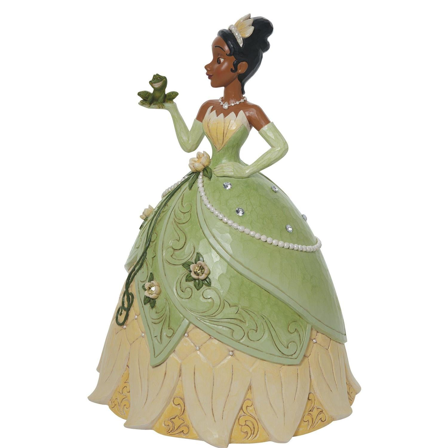 Tiana holds her soon-to-be prince, the frog, in a spectacular floral dress and tiara. Sideview 2
