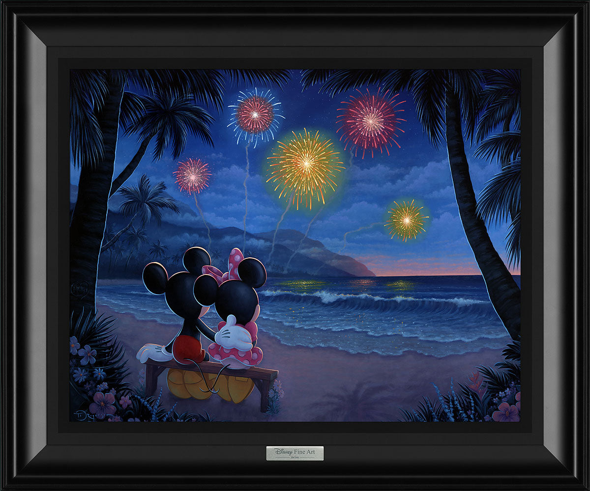 Mickey and Minnie are sitting on the beach enjoying the evening's fireworks.