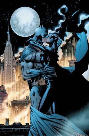 Batman and Catwoman embraced in a kiss, Gotham City and a full moon in the background.