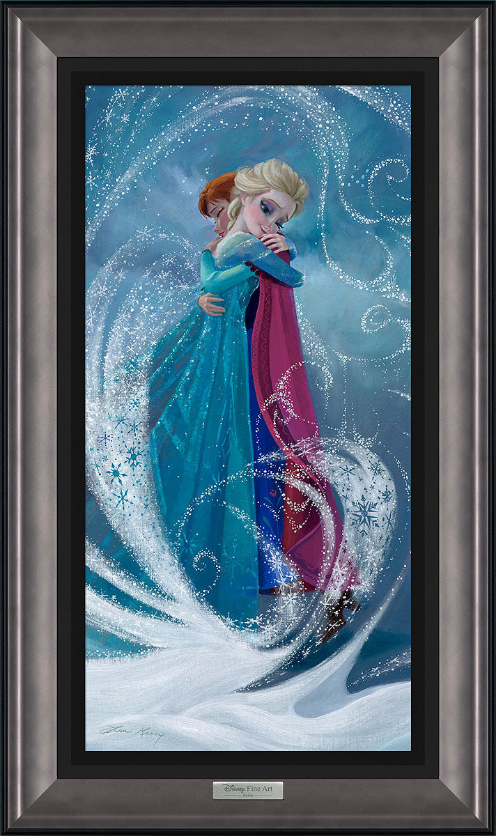Elsa and Anna share a warm heart hug.