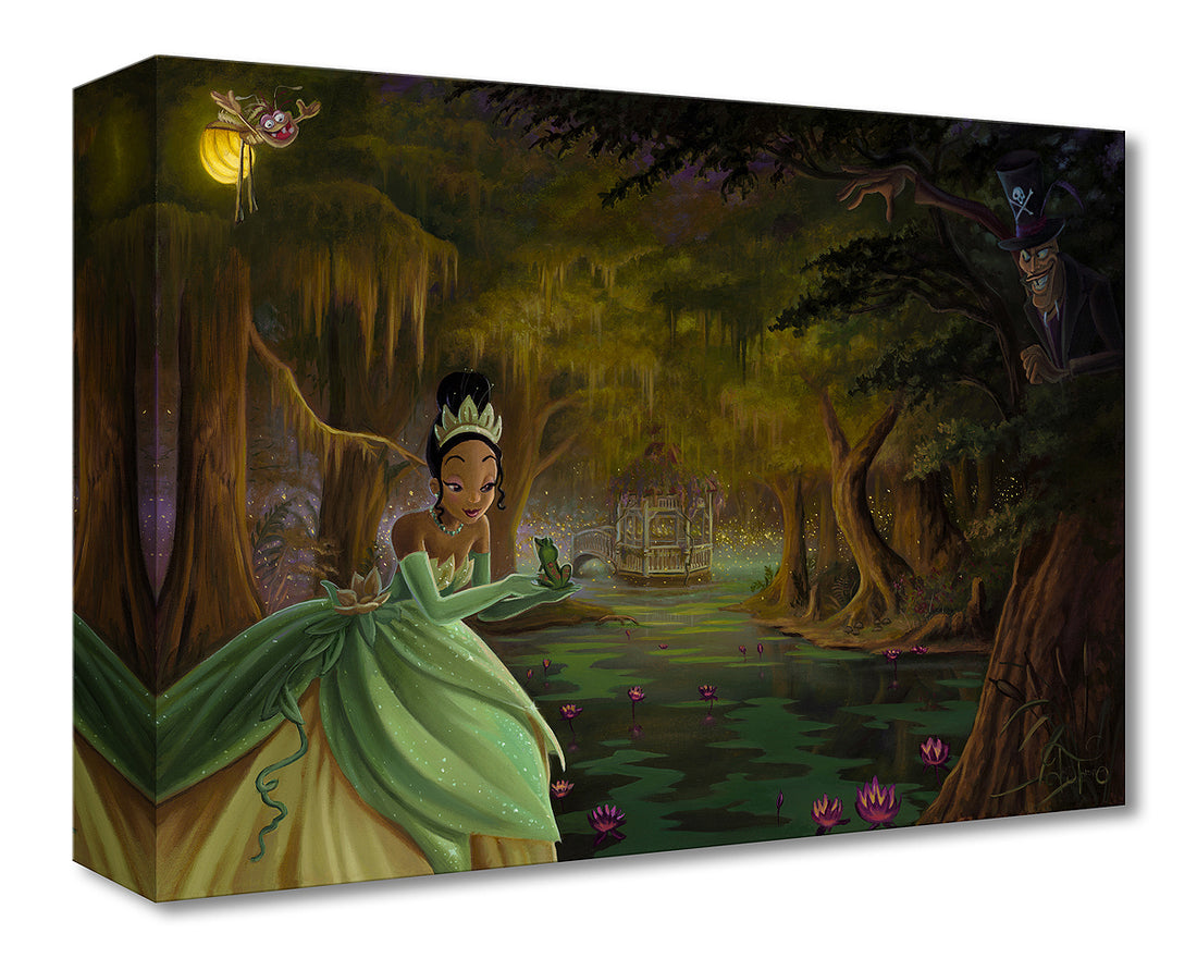 Princess Tiana is holding the prince frog in the palm of her hand.