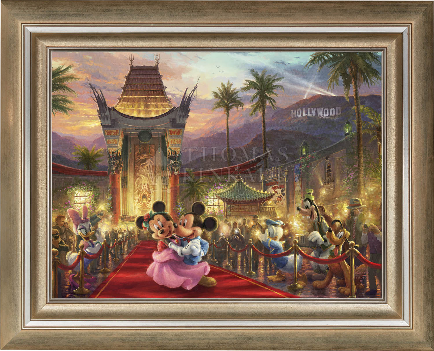 In this flashing Hollywood scene, Mickey and Minnie walk the red carpet. Brushed Gold  Frame