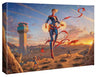 The morning sun dawns on a new day amplifying the glowing power emanating from Captain Marvel’s hands as she watches over the desert base. - Gallery Wrap Canvas