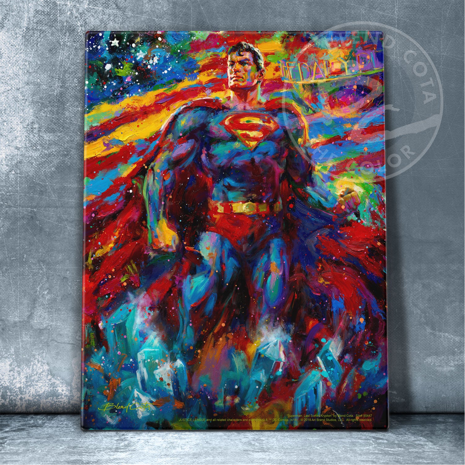 Red and blue tones are proudly used throughout this patriotic piece as Superman’s cape blends into the American Flag.