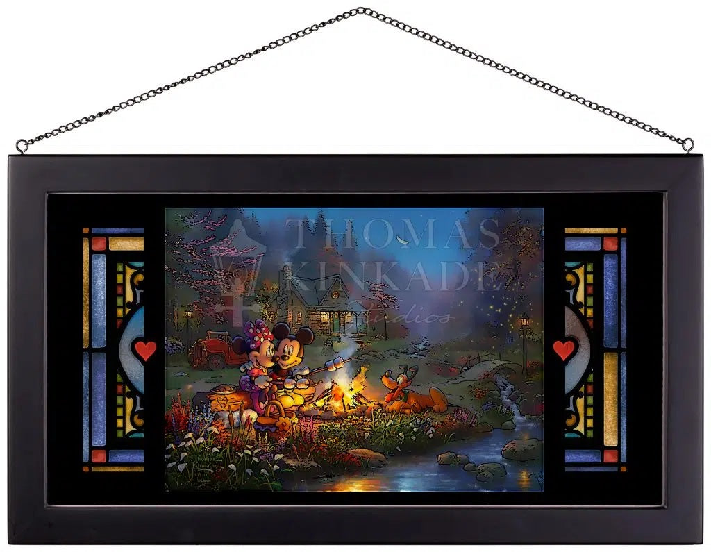 Mickey and Minnie are relaxing on an old log, roasting marshmallows over a crackling campfire.