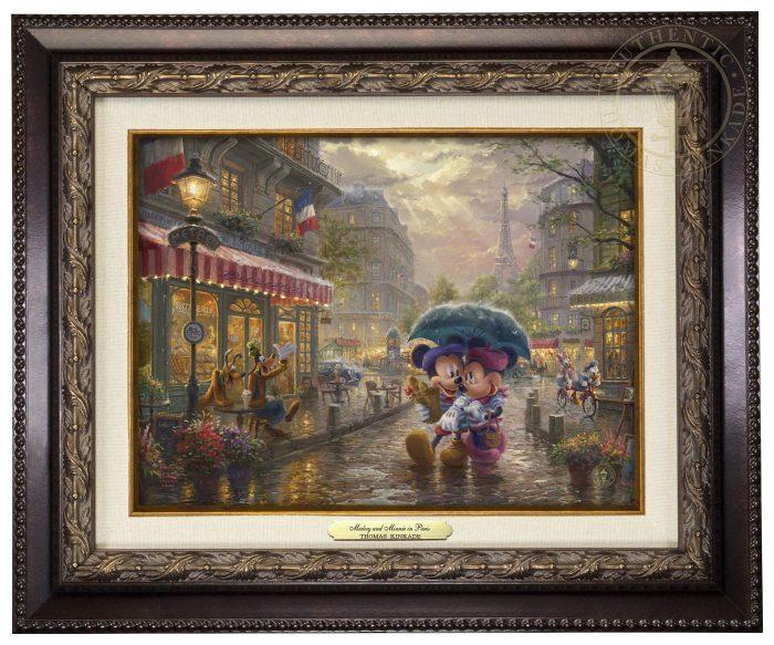 Mickey and Minnie in Paris by Thomas Kinkade Studios.  Dressed in traditional French attire, Mickey and Minnie enjoy playing tourist in their berets and striped shirts after spending the morning at the cafe - aged bronze frame