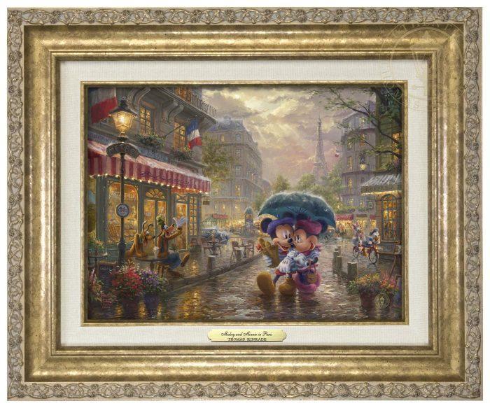 Mickey and Minnie in Paris by Thomas Kinkade Studios.  Dressed in traditional French attire, Mickey and Minnie enjoy playing tourist in their berets and striped shirts after spending the morning at the cafe - antique gold frame