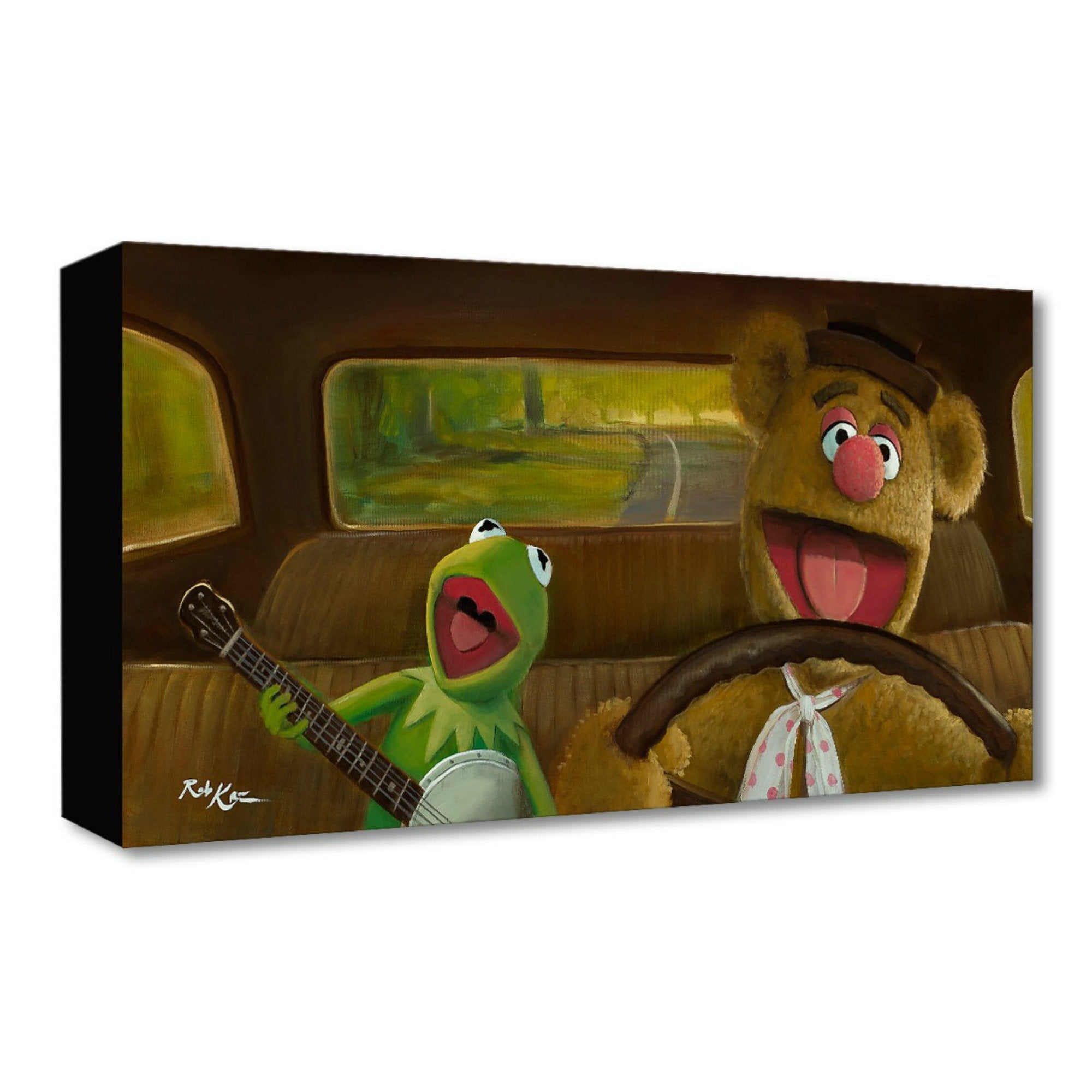 Movin Right Along by Rob Kaz.  Fozzie the bear behind the driver's wheel, singing along with Kermit the Frog has he plays his banjo. 
