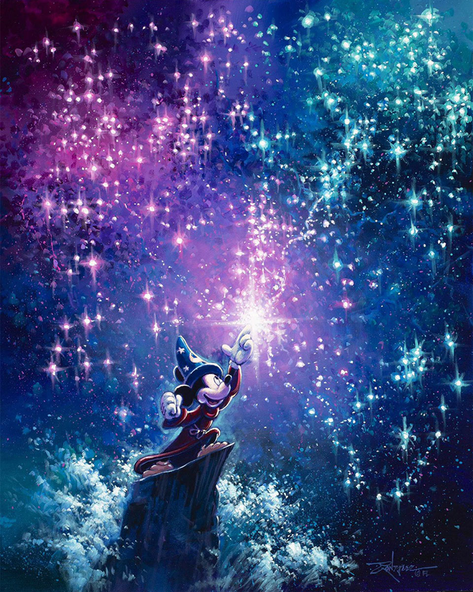 Sorcerer's Apprentice Mickey fills the night sky with colorful magical star-lights.