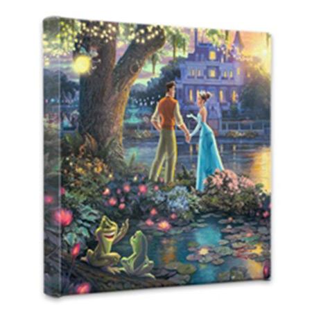 Tiana and the Prince stand by the bayou river edge holding hands under the oak tree, as the two frogs (Tiana and the Prince) watch. 14x14