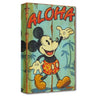 Mickey welcomes the Island's guest with an Aloha wave.